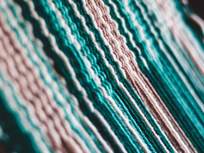 Weaving threads, representing the craft of storytelling